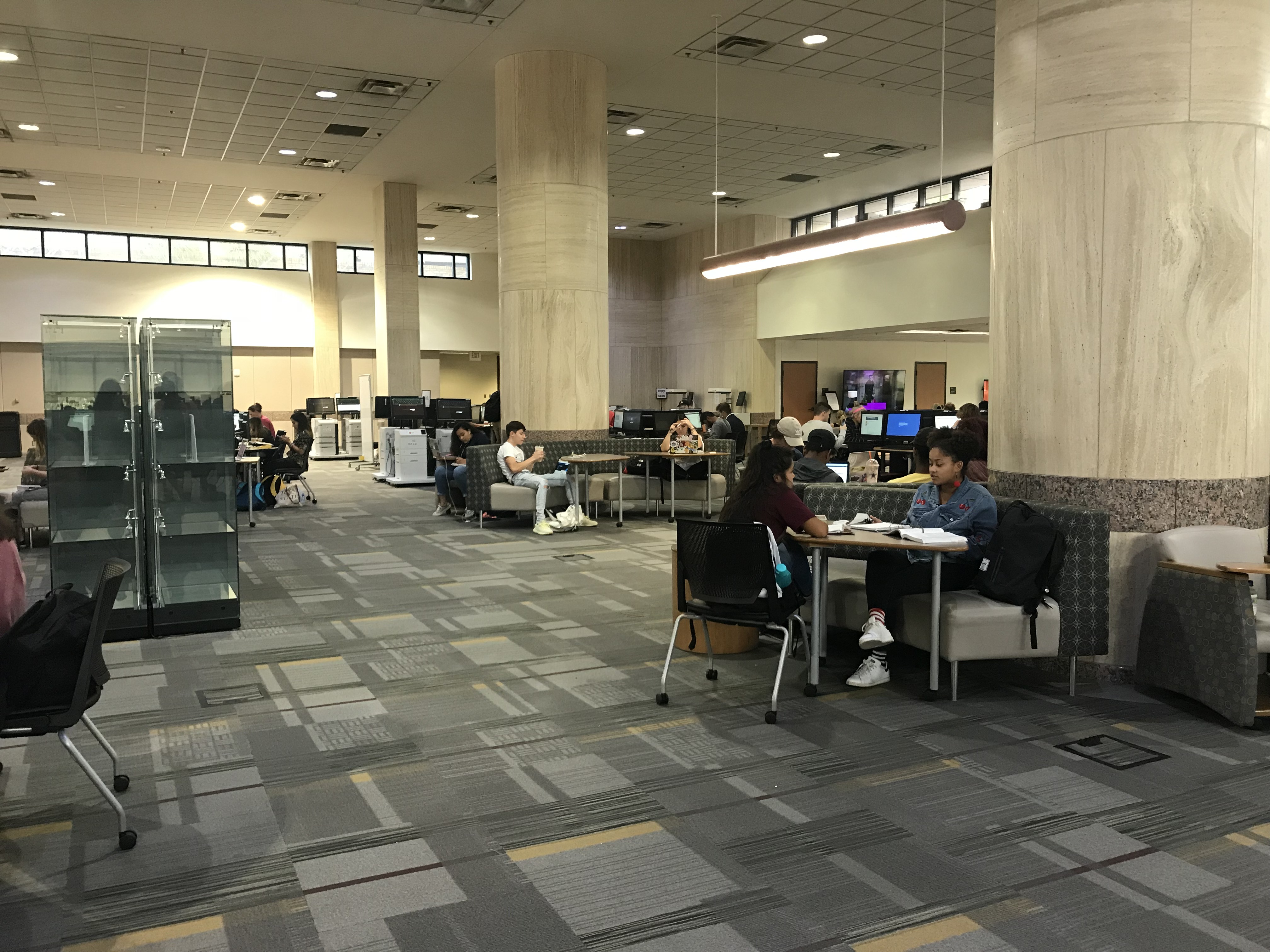Students sitting in Alkek Library