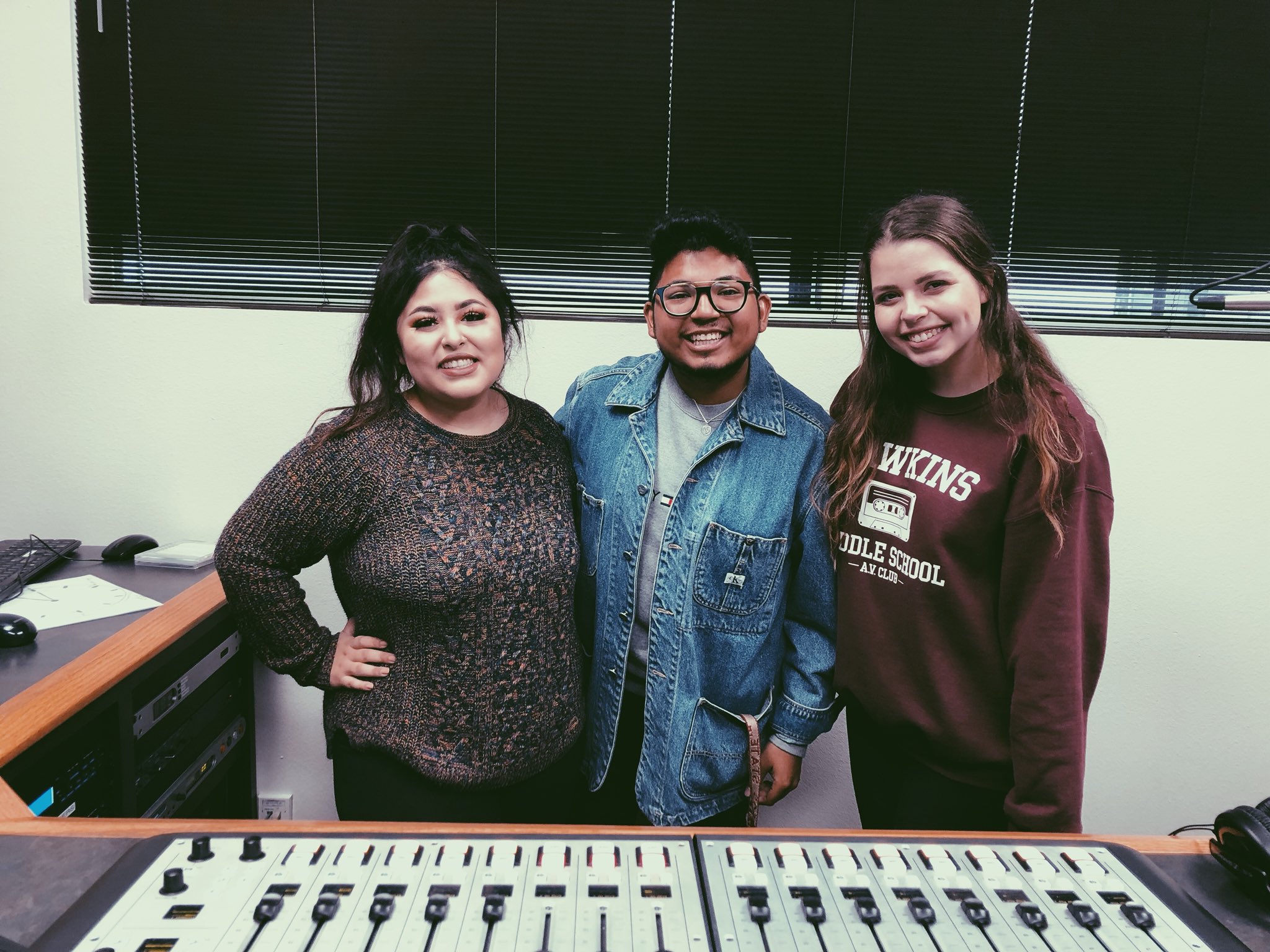 April Gutierrez, Alex Garcia, and Lexi Ashbury in the on-air studio.