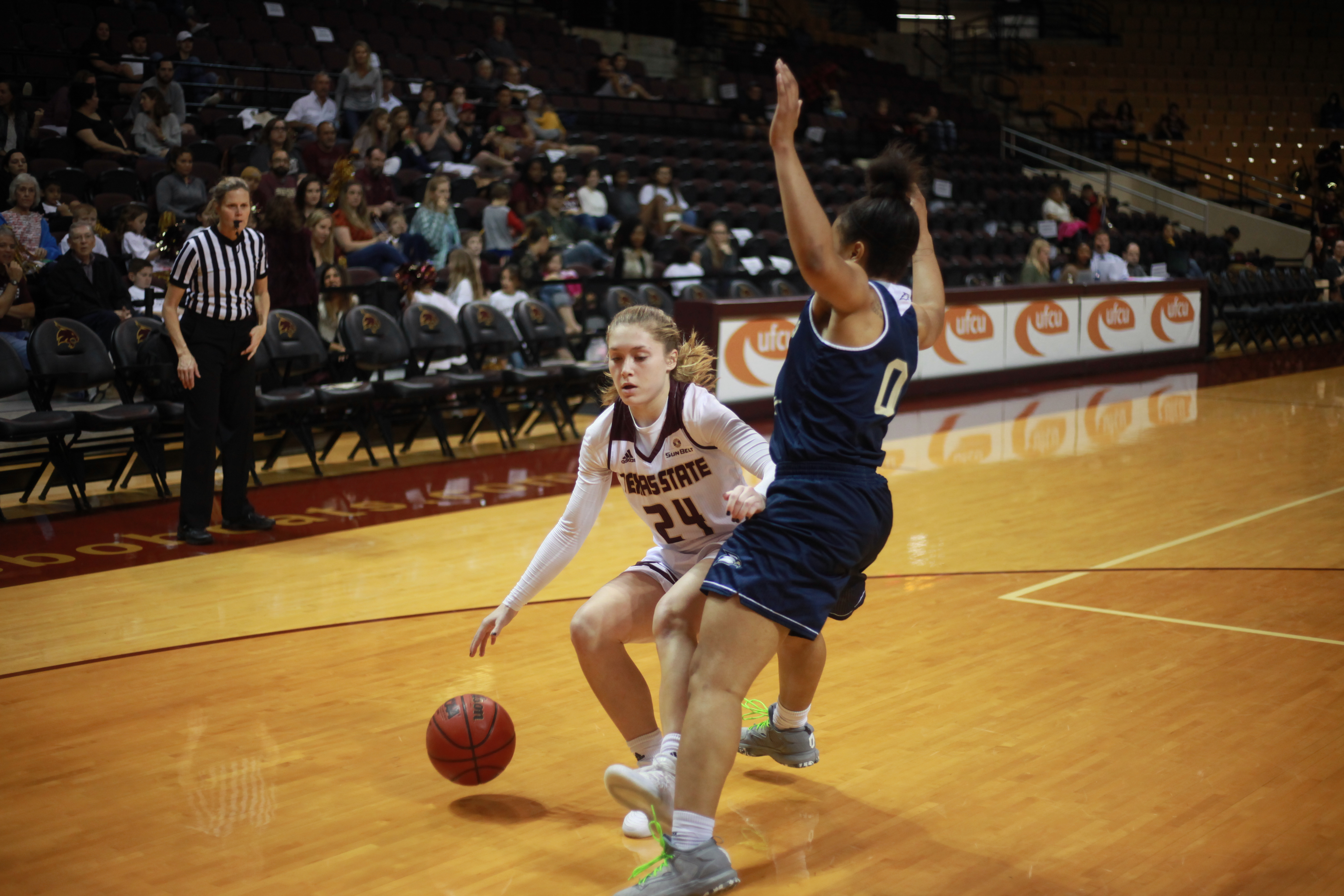 Starting Guard Brooke Holle drives to the hoop knocking down two of her seventeen total points