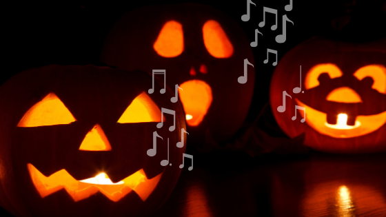 Three lit jack-o-lanterns sit against a dark background with music notes coming from their mouths.