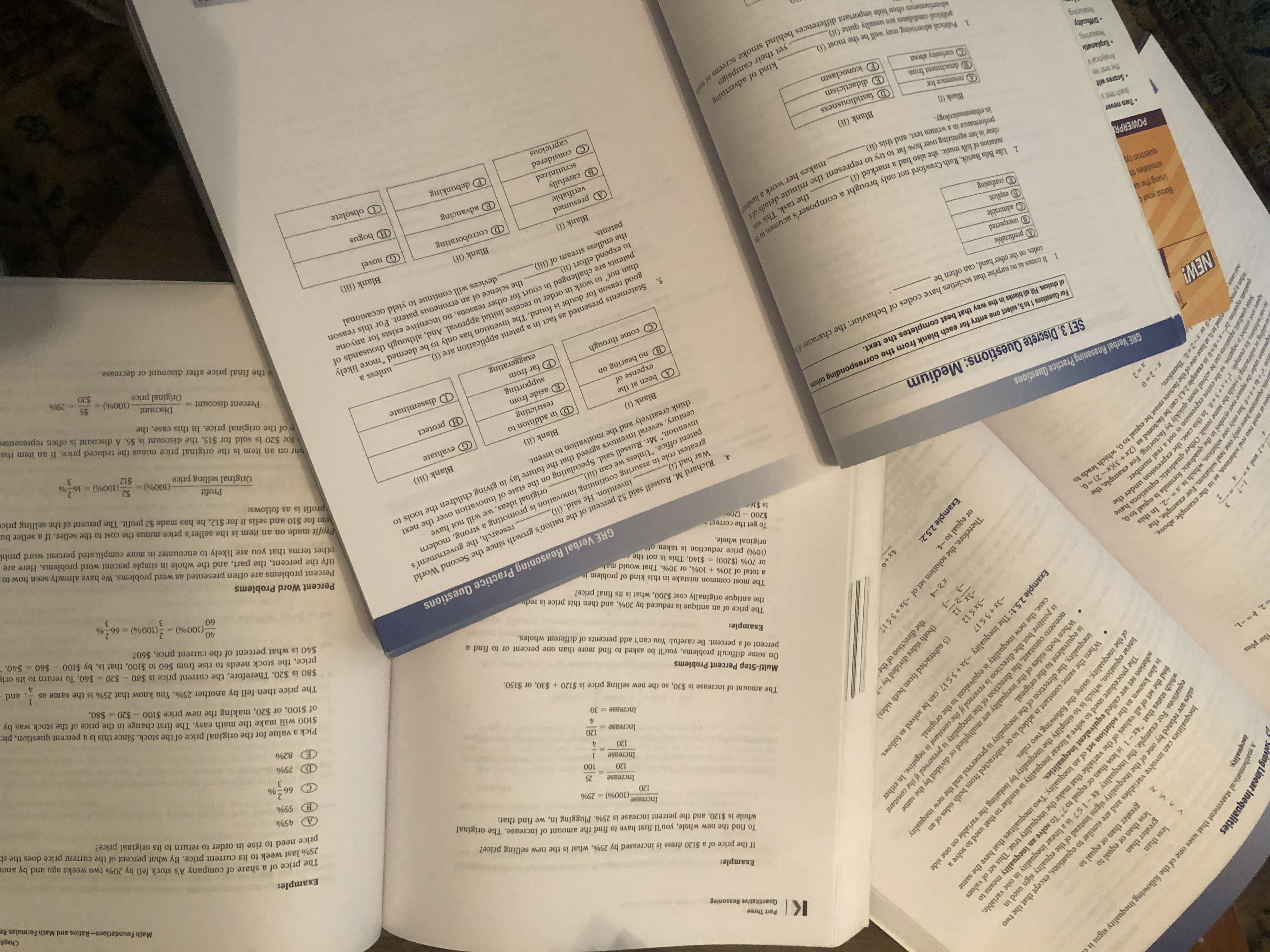 Open GRE prep books lying side by side