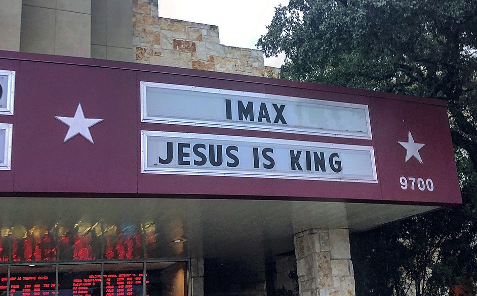 The sign outside an Austin movie theatre showing Jesus is King.