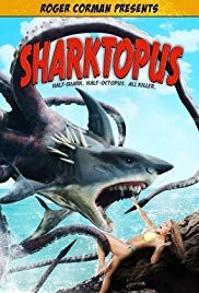 A drawing of a shark-octopus hybrid about to eat a girl laying on a rock