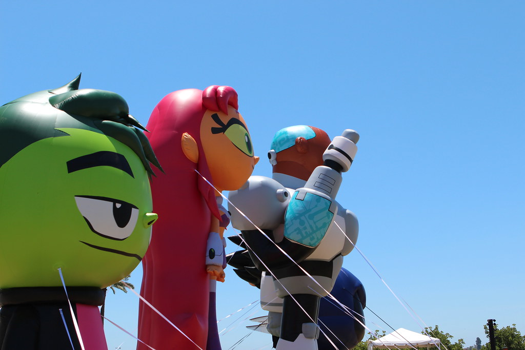 Three large balloons depicting the characters of Beast Boy, Starfire and Cyborg from “Teen Titans Go!”