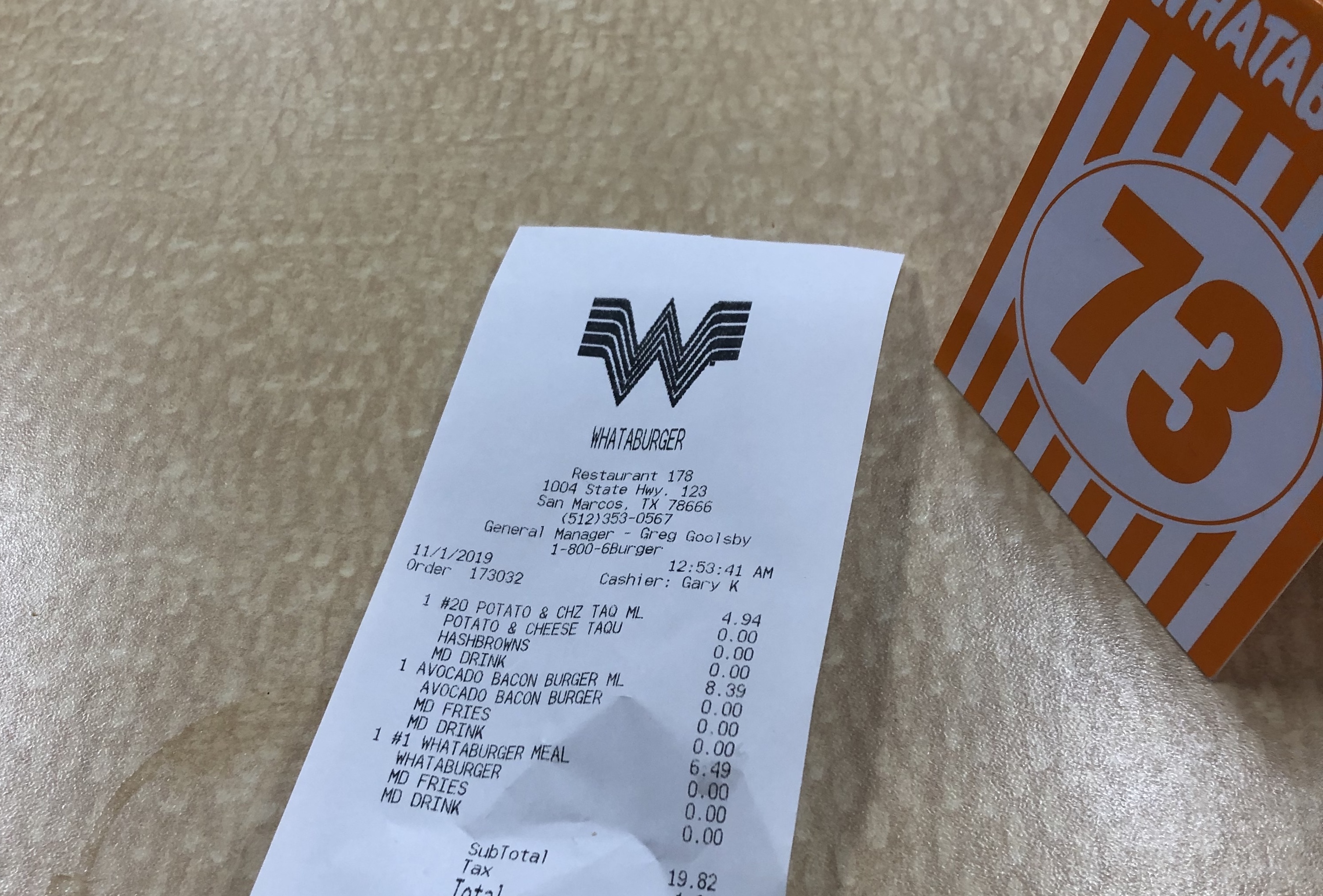 This is a picture of a whataburger number and the receipt on what my friends and I bought.