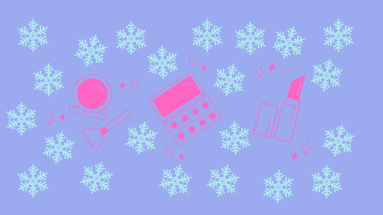 Pink cosmetic products with blue snowflakes as background.