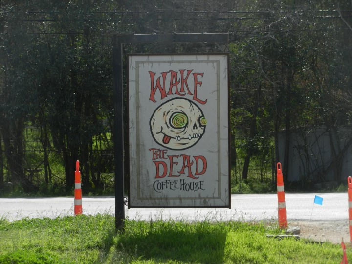 A Wake the Dead sign attracts potential customers.