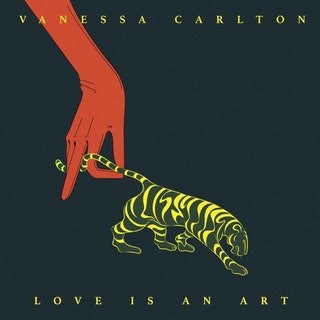A black album cover with a simple drawing of a red hand holding a tiger’s tail.  At the top of the image is the artist’s name and at the bottom is the name of the album.  