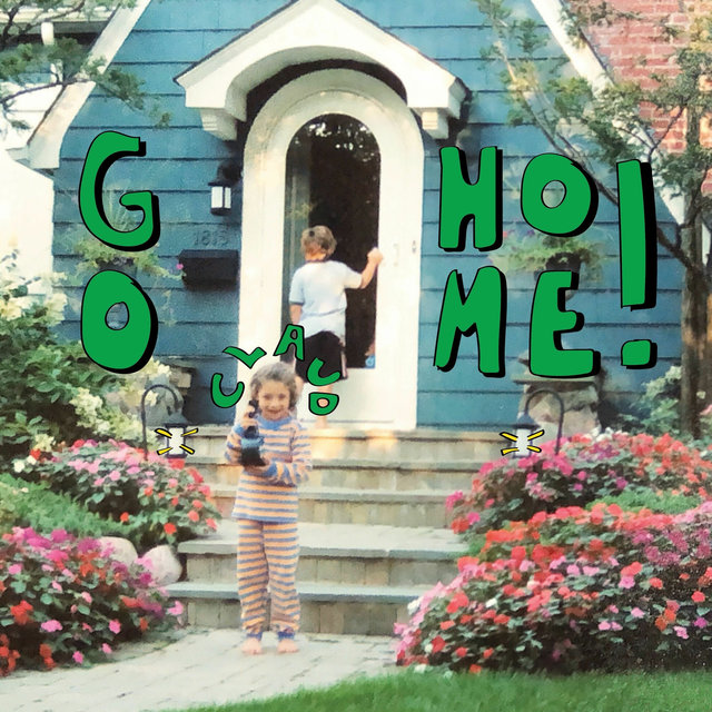 Two children are seen in front of a blue house with green bubble letters surrounding them that spell out “Go Home!”. Pink flower bushes surround the child at the front and the child in the back is seen seemingly ringing the doorbell. The name Claud surround the child in front’s head and two lights next to them are shimmering in a cartoon manner.