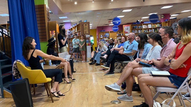 On the second floor of BookPeople, Ottessa Moshfegh sits in a yellow velvet chair, smiling before her audience—their postures slamted forward in anticipation. A wooden coffee table lies between Moshfegh and moderator, Genevieve Padalecki. Padalecki looks up, to her left, as a salesperson stands with a microphone, introducing the speakers of the event.