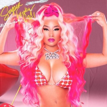 Nicki Minaj’s profile picture on Twitter, she’s wearing a bikini, a large pink wig, heavy makeup, and a large necklace that reads “Barbie”. The upper-left corner contains the title of her latest single, “Super Freaky Girl”.
