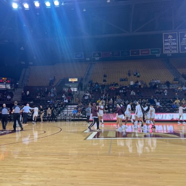 Texas State women's basketball celebrates after victory against Southern Miss.