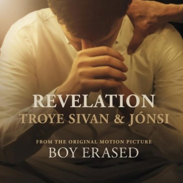 o Man hunched over in a white button down covering his face with his hands, another hand is grabbing his shoulder. In front of the image are the words Revelation, Troy Sivan and Jónsi, and Based on the original motion picture film boy erased. Description: