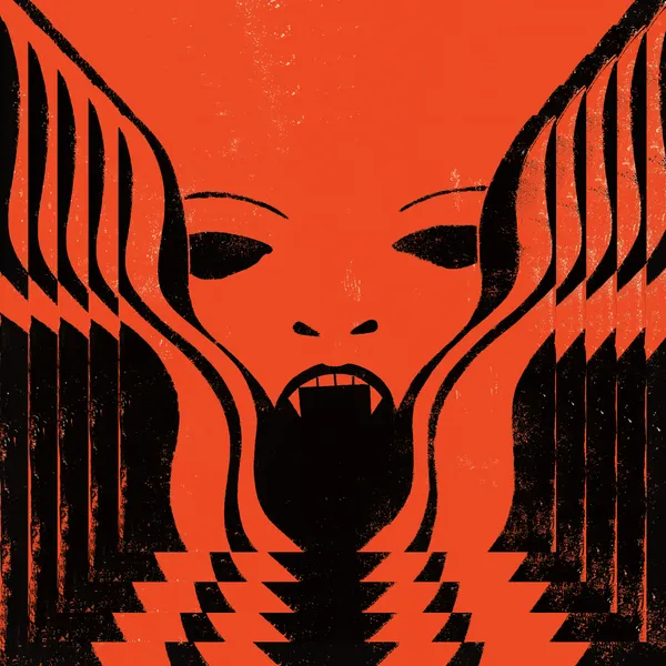 The album cover shows a red and black figure of a monster with sharp canines. The figure is being rippled to show a red and black effect. 
