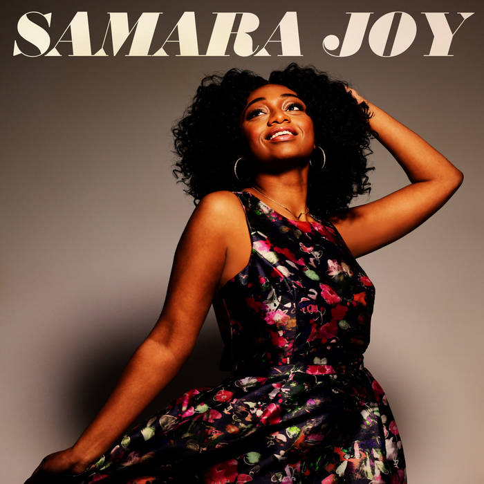 The album cover shows Samara Joy standing in a flower dress against a gray background and her name above her in large font