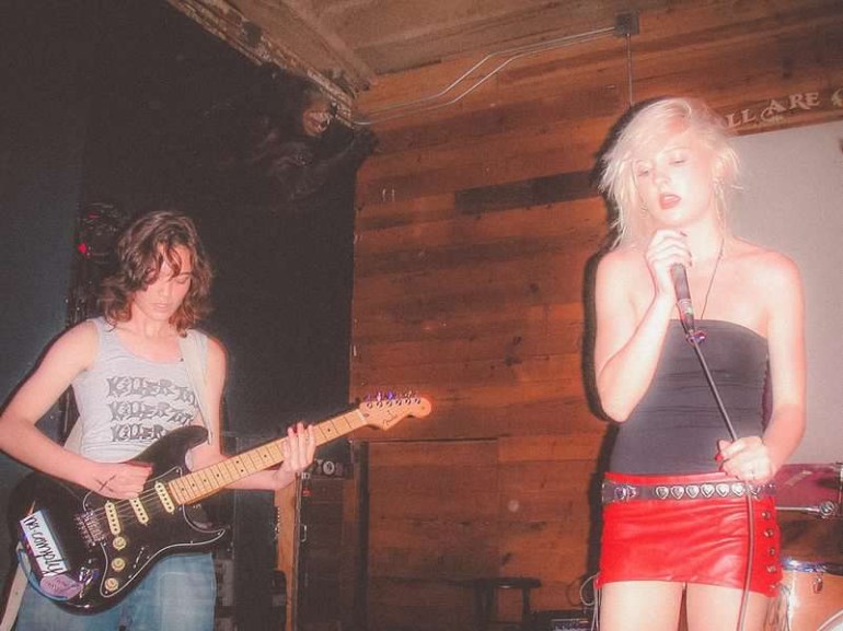 Image features members of the band Killer Tits playing at the Fresh Meat event.