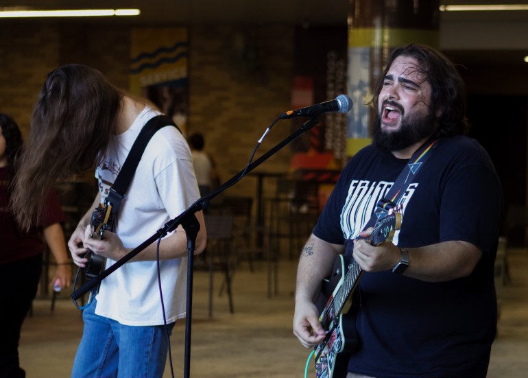 The band GOOD.’s lead guitarists putting on a show!