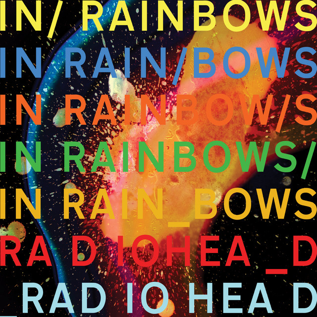 splash of paint with the album name through the cover in different colors