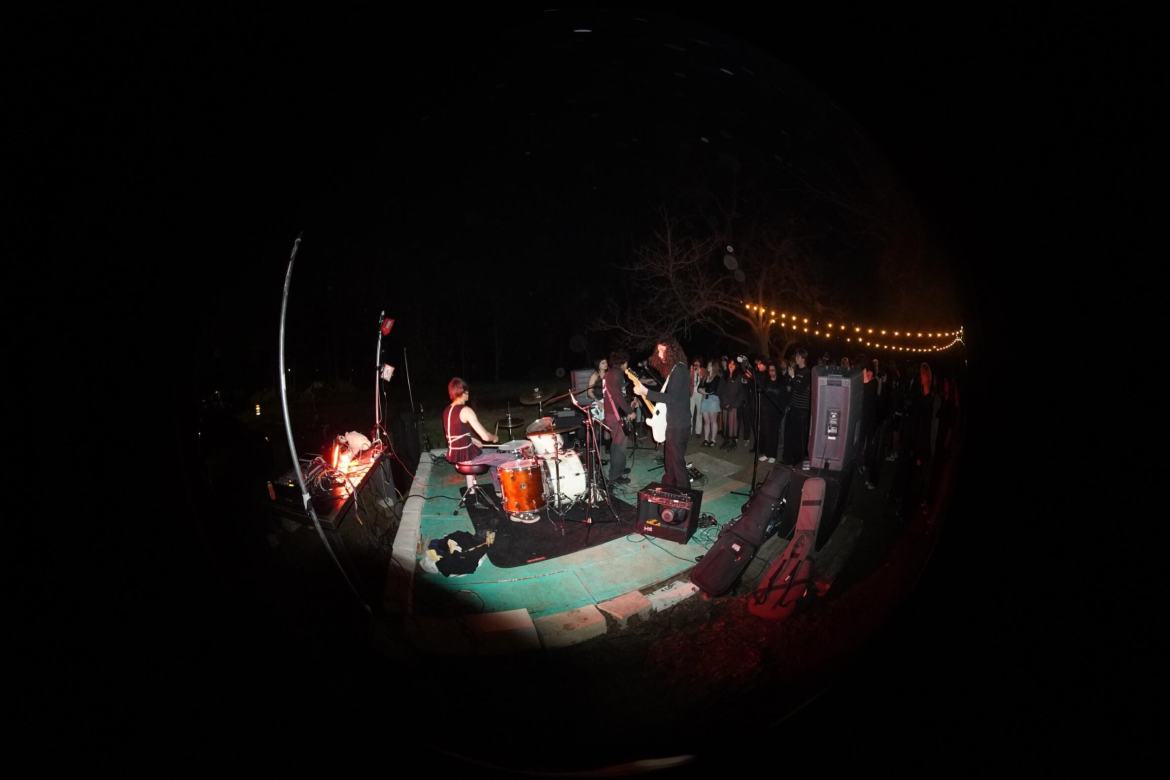 Fisheye image of green stage at private park.