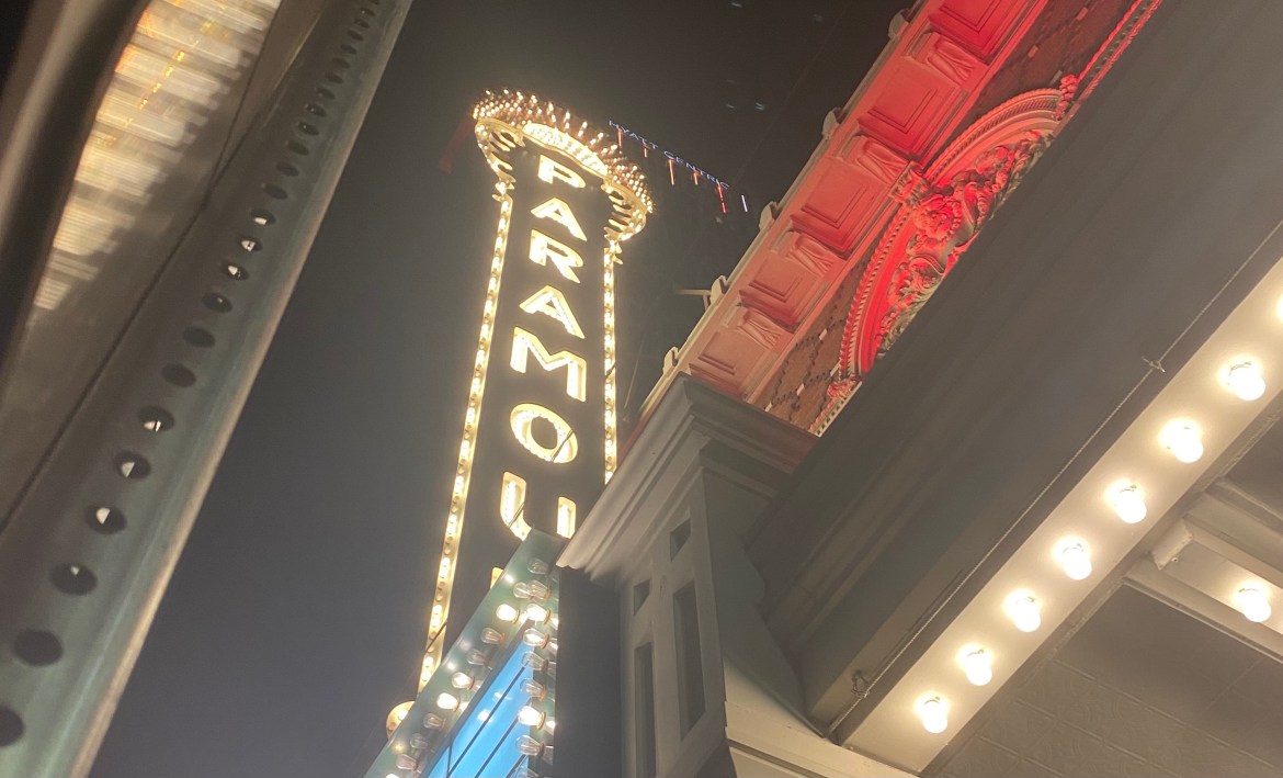 Picture of lit up sign of Paramount Theatre in Austin wit bright lights