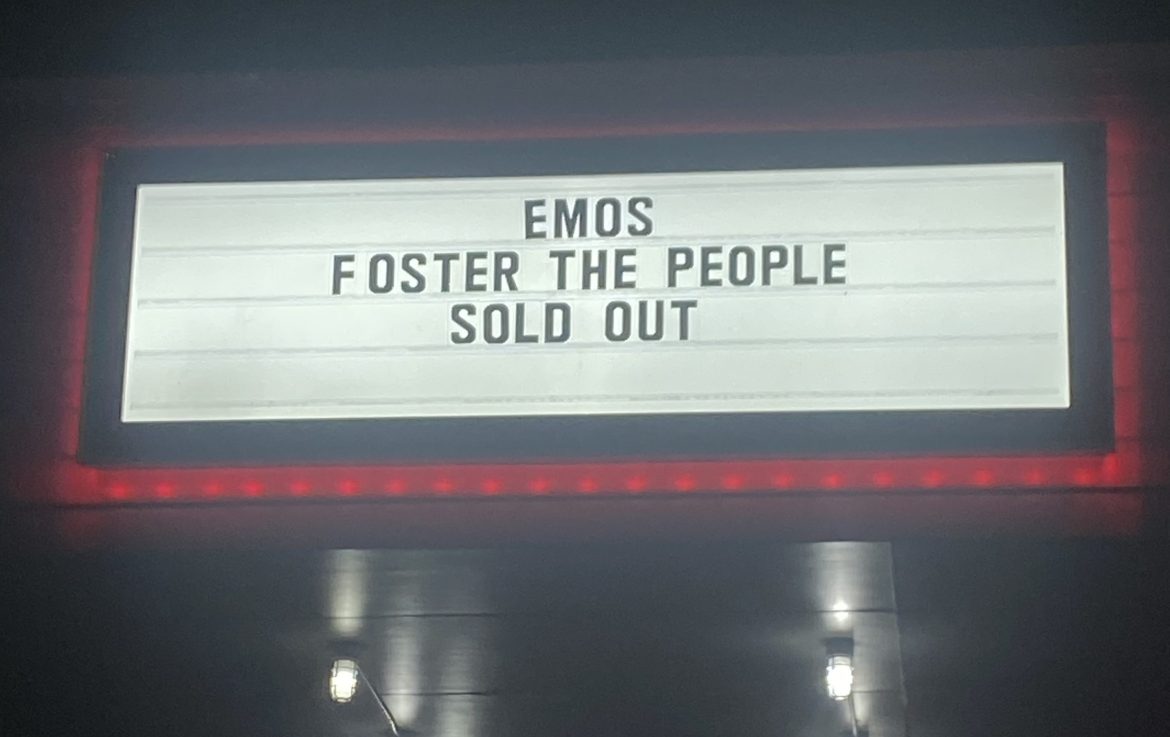 bright white and red sign with black lettering that says "Emo's Foster the People sold out"