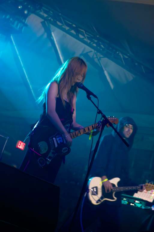 Vertical shot of wisp playing guitar at stubb's
