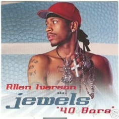 Allen Iverson shirtless looking to the side, clutching jewelry in his hands with album title printed below