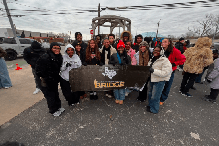 BSA members holding up a BSA sign at the MLK march