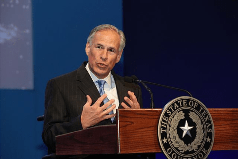 Governor of Texas at a podium speaking