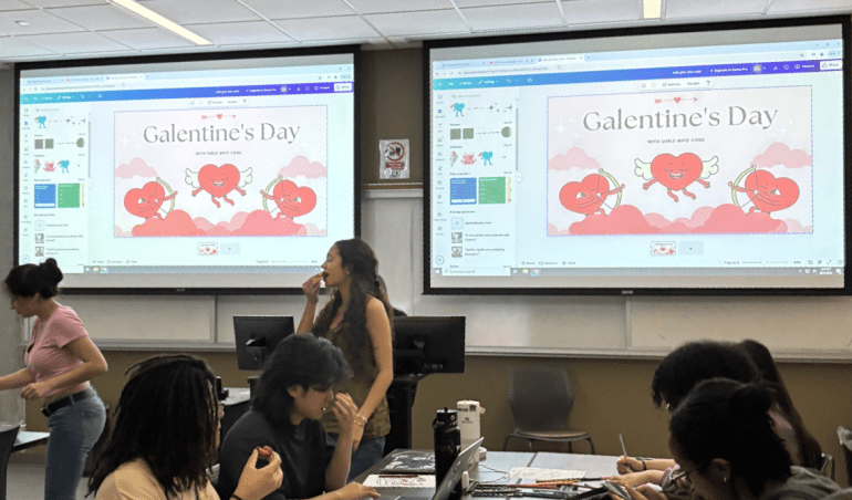 7 members of Girls Who Code are coloring and eating snacks at the Galentine's Day social event.