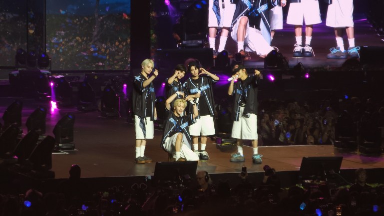 Tomorrow by Together cutely posing at the end of their MOA Diary performance so fans can take a picture.  