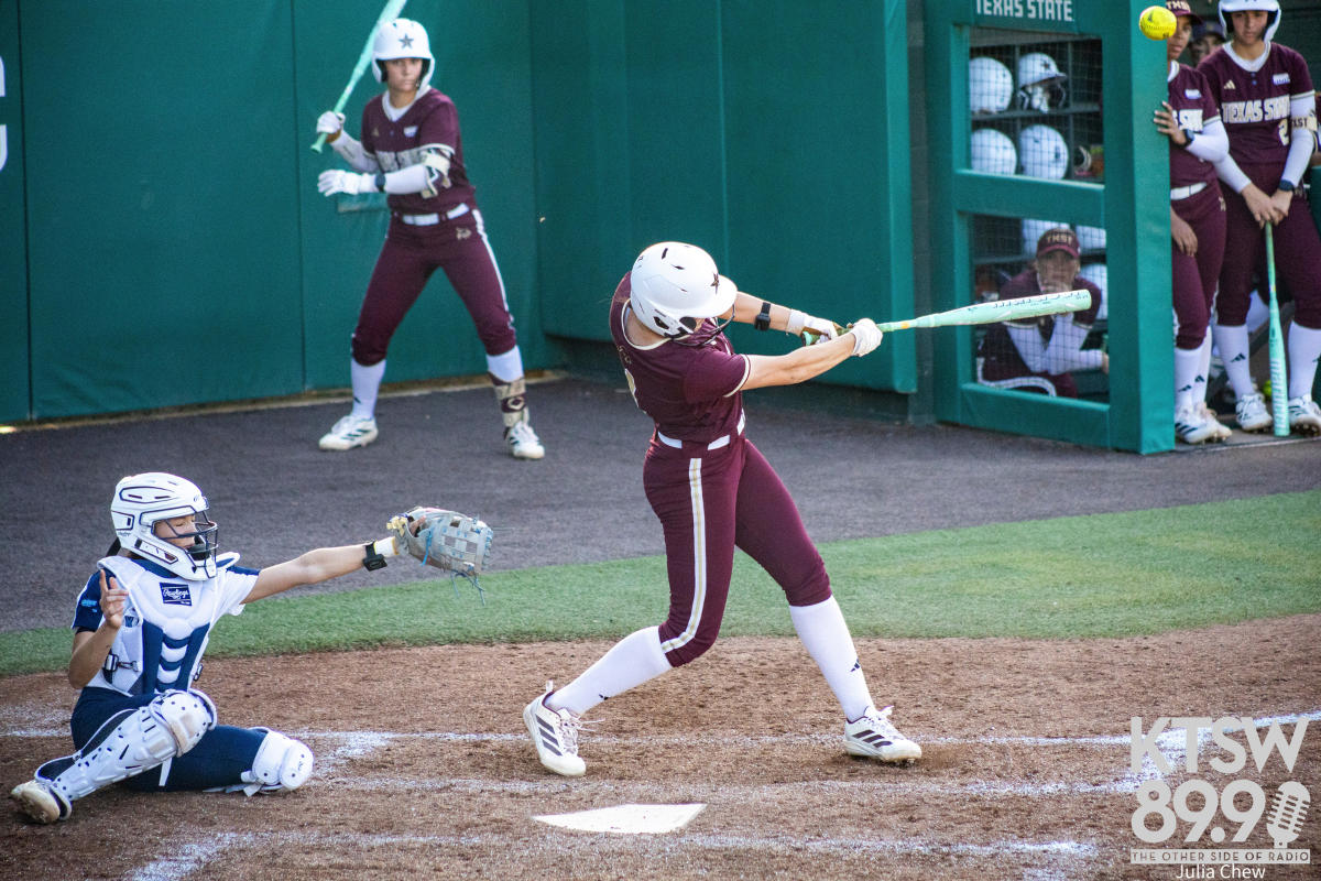 Texas State hitter swings at a ball.