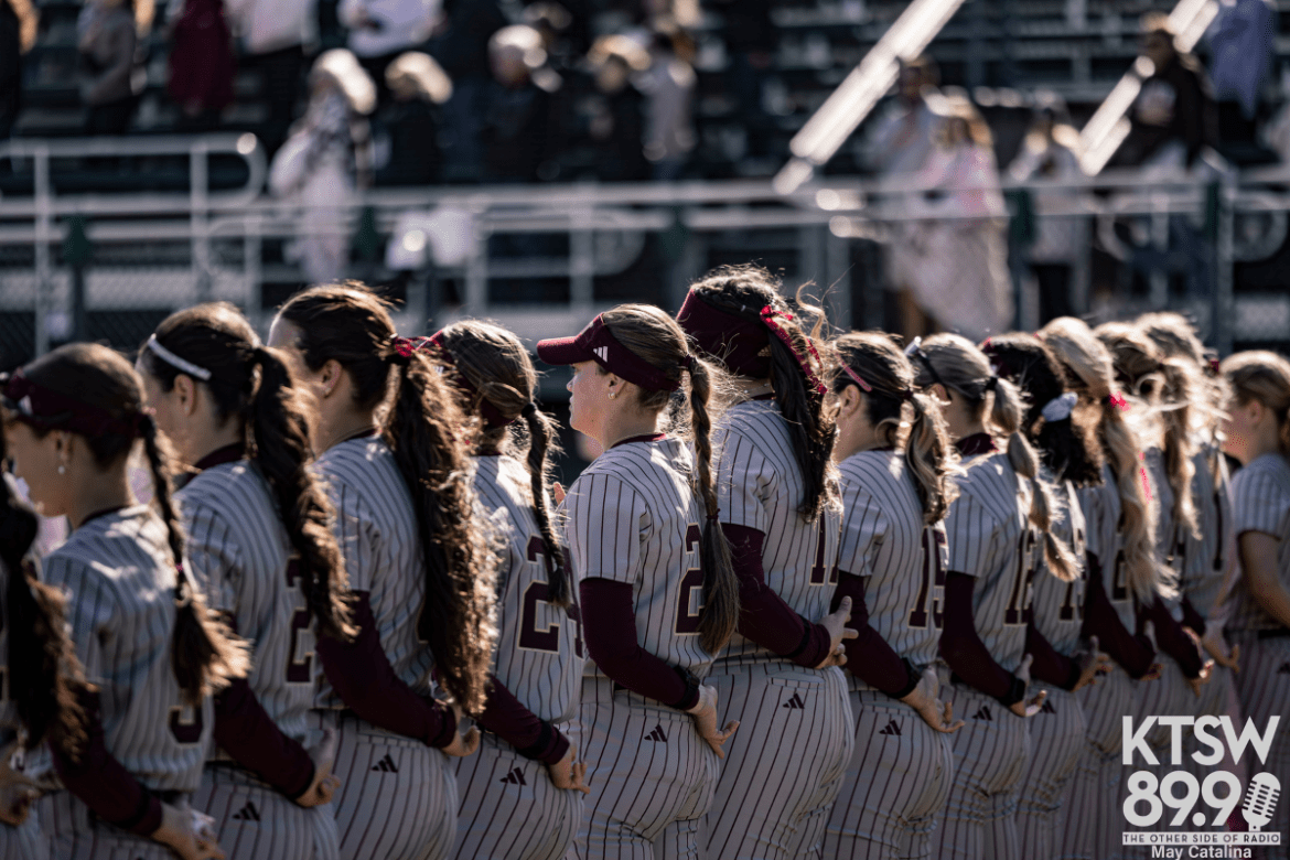 Texas State players are lined up for the national anthem.