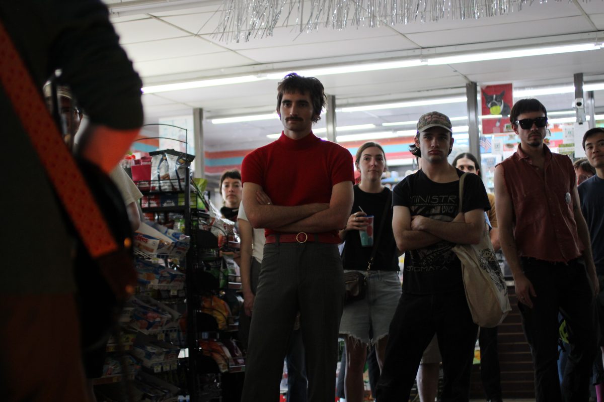 People standing around at Friendly Rio Market