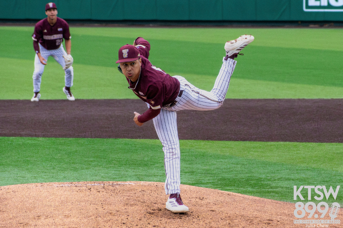 Jesus Tovar throws a warm up pitch before the start of the game.