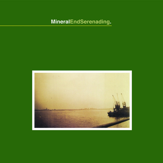 A green album cover with a small picture of the horizon in the center. The title “EndSerenading” is seen above the picture.