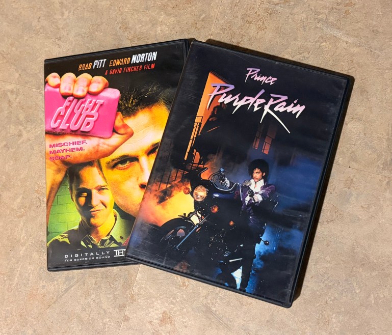 Physical DVDs of Purple Rain and Fight Club movie. 