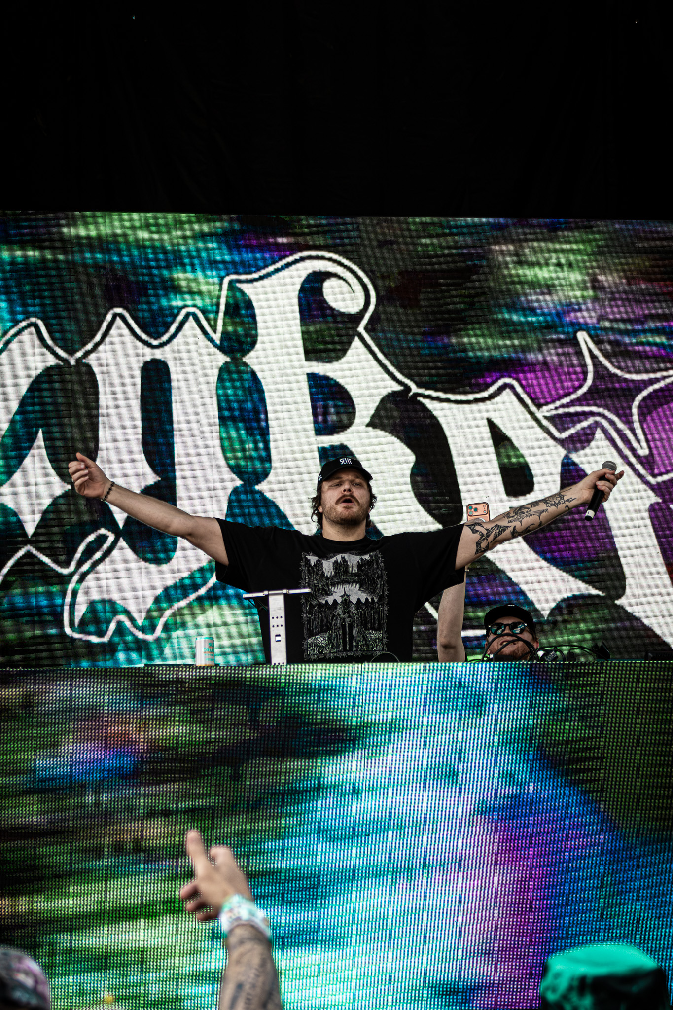 DJ Cozy Kev behind his booth at San Marcos Block Party 
