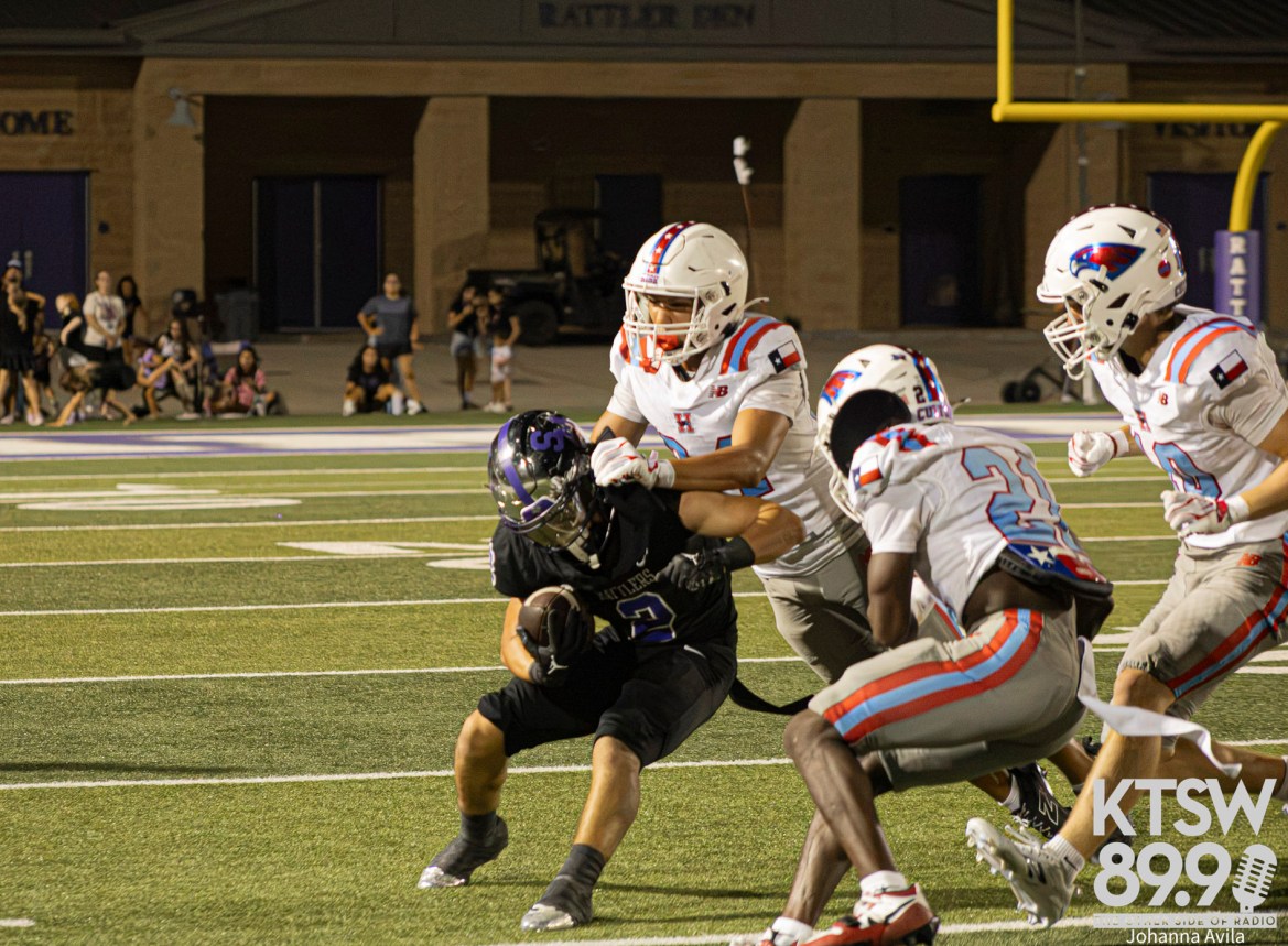 Rattlers rb swarmed by flock of Hawks