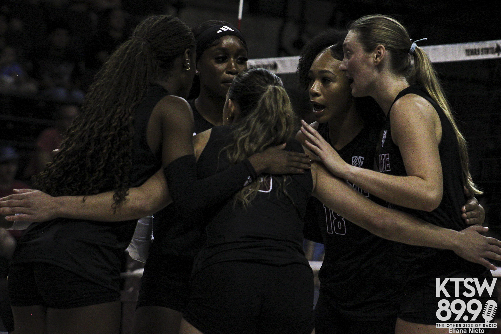 Bobcats in a team huddle