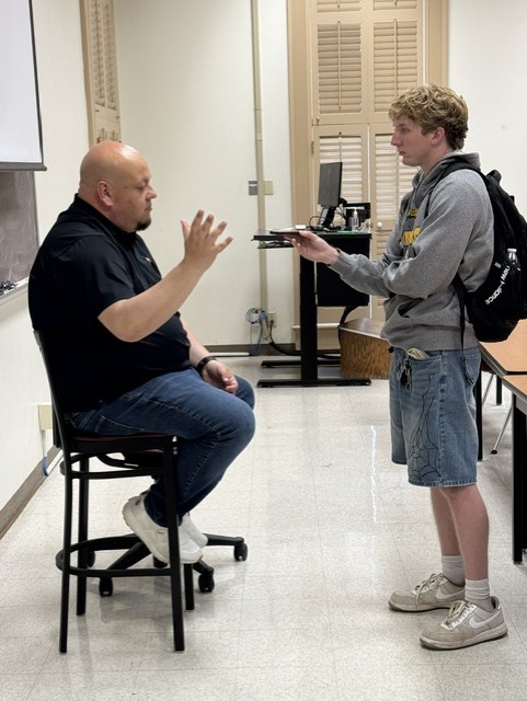 Jeff Howe (left) speaks to Ben Cameron (right) in a 1 on 1 interview.