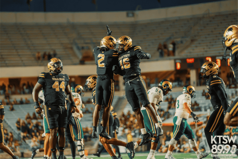 TXST Defense celebrating against CSU